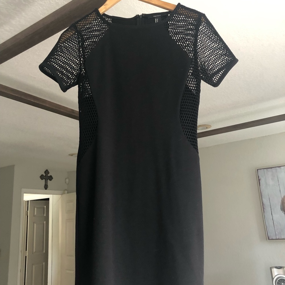 Forever 21 black and mesh black dress.